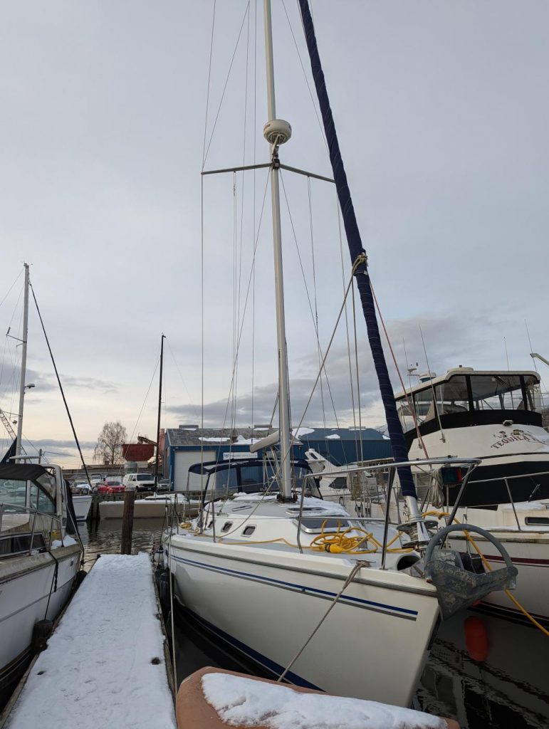 My sailboat at a snowy dock.